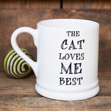 "The cat loves me best" mug