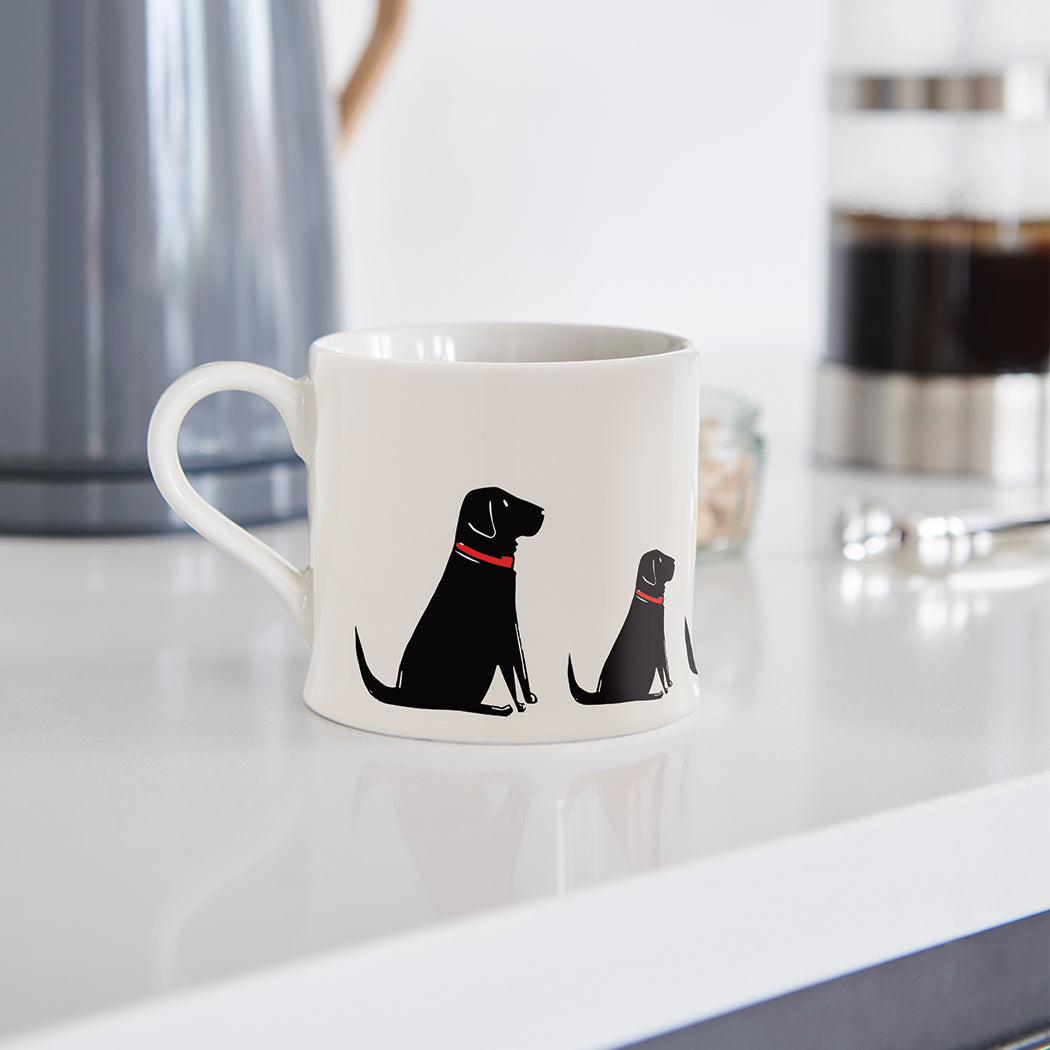 Sweet William Black Labrador Mug lifestyle shot — illustrated Black Lab ceramic mug