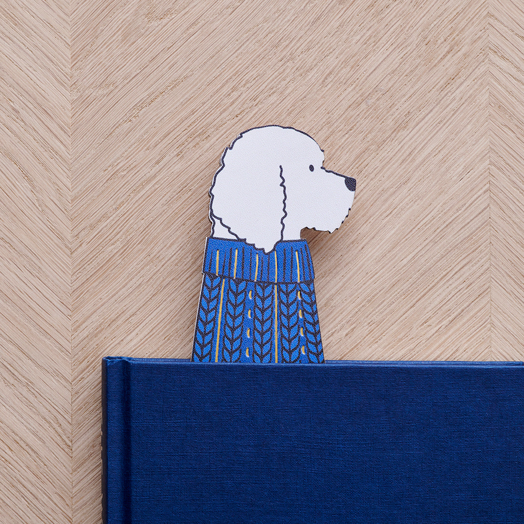 Apricot Cockapoo / Labradoodle bookmark peeking out of navy book — illustrated dog in blue jumper, vegan PU leather bookmark by Sweet William Designs