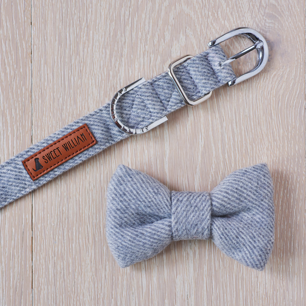 Grey tweed dog bow tie shown with a matching tweed dog collar