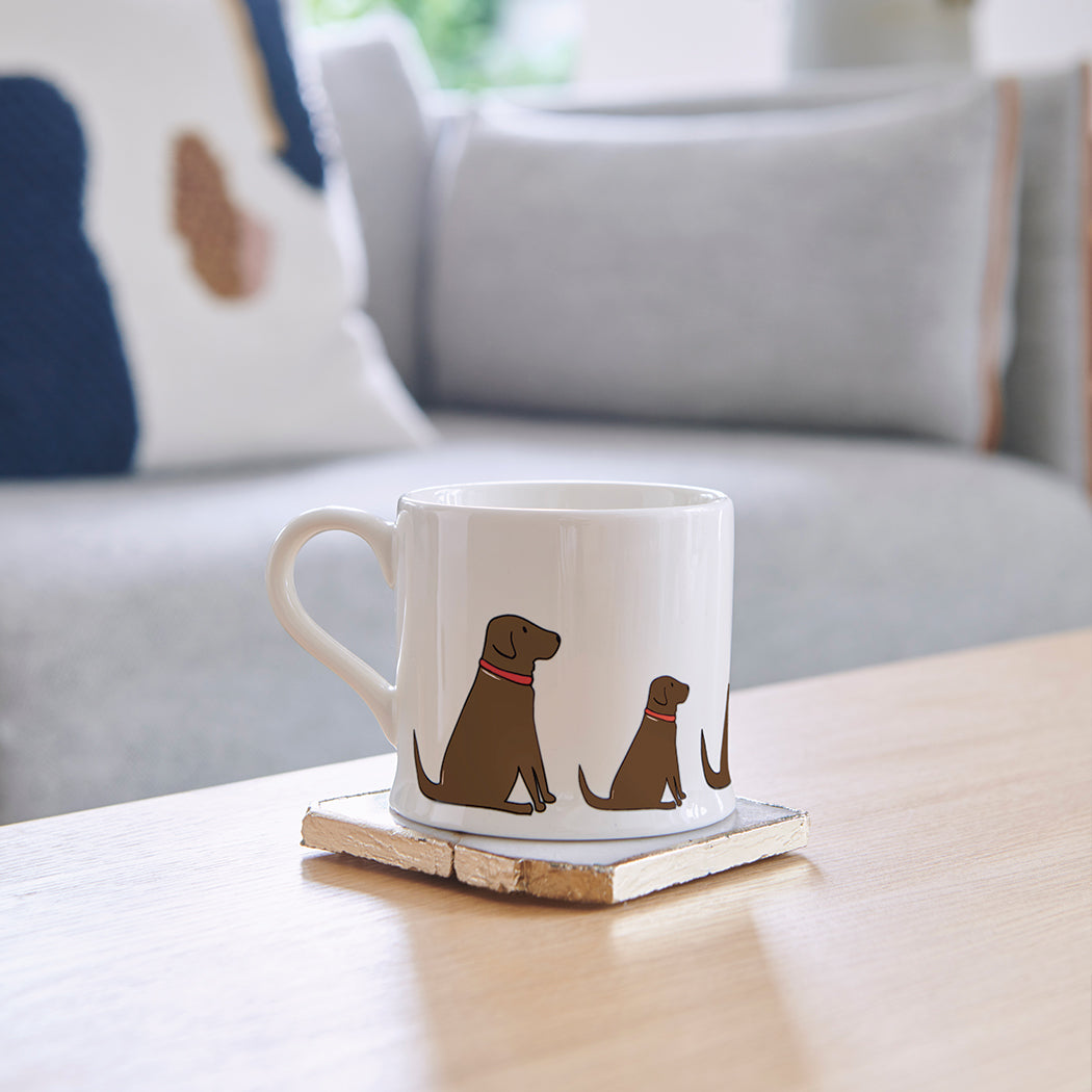 Sweet William Chocolate Labrador Mug lifestyle shot — illustrated Choc Lab repeat pattern ceramic mug
