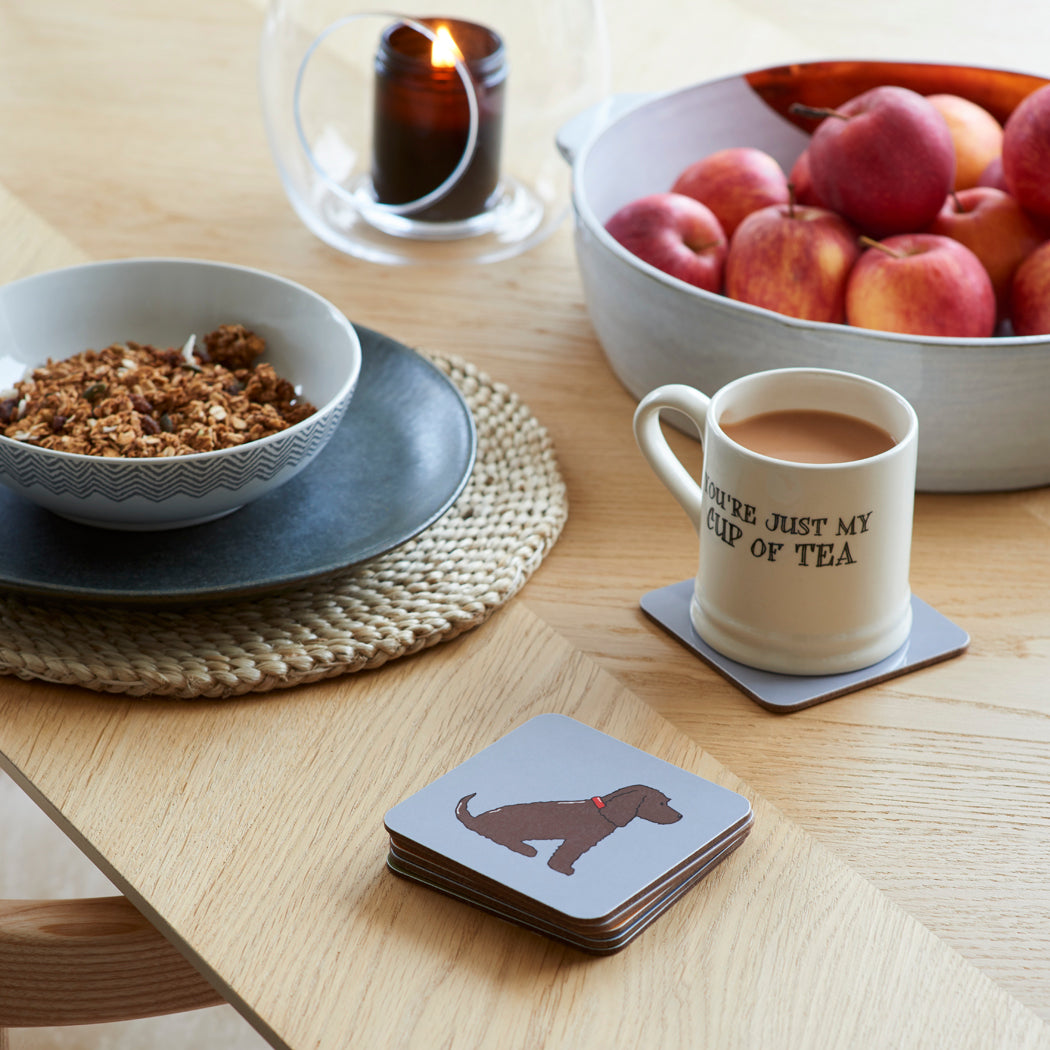 Sweet William Chocolate Cocker Spaniel coaster lifestyle shot — matching Chocolate Cocker Spaniel mug and coaster gift set