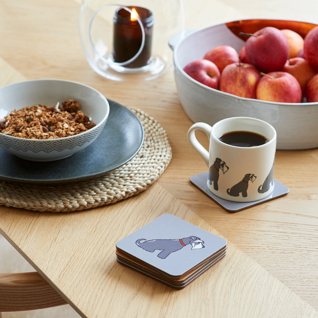 Sweet William Grey Schnauzer coaster lifestyle shot — matching Grey Schnauzer mug and coaster gift set