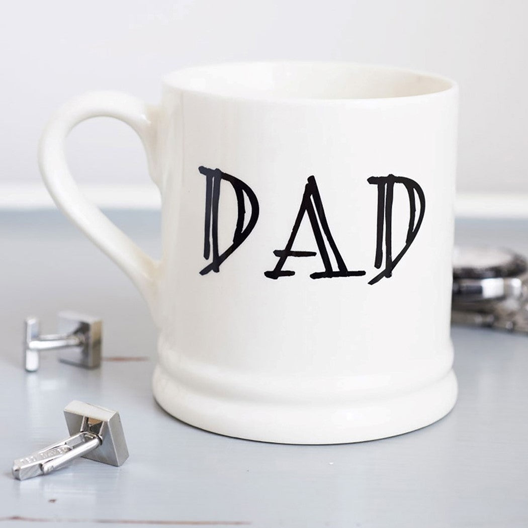 Simple ceramic Dad mug shown with cufflinks, a lovely everyday gift for Dad