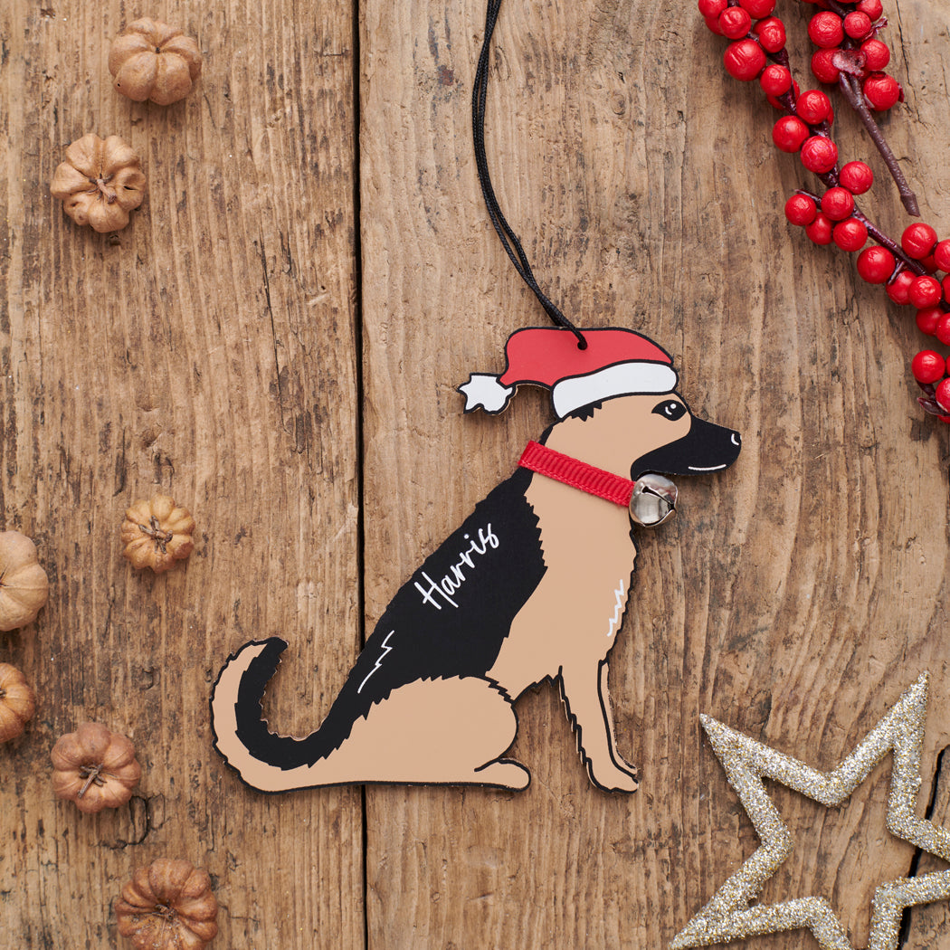 Personalised German Shepherd Christmas decoration with name — wooden dog decoration with Father Christmas hat and jingle bell collar, thoughtful dog lover gift by Sweet William Designs