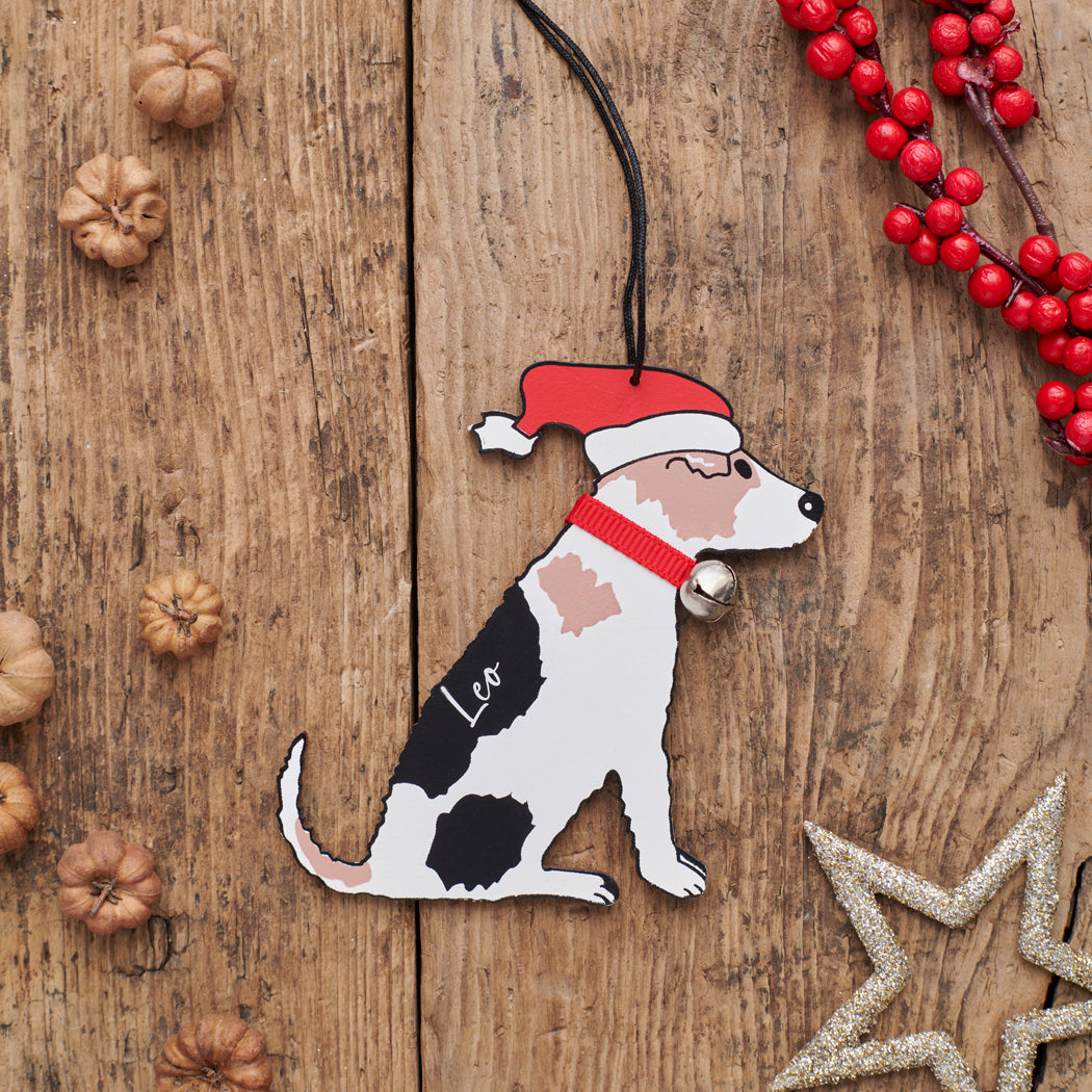 Personalised Jack Russell Christmas decoration with name — wooden dog decoration with Father Christmas hat and jingle bell collar, thoughtful dog lover gift by Sweet William Designs