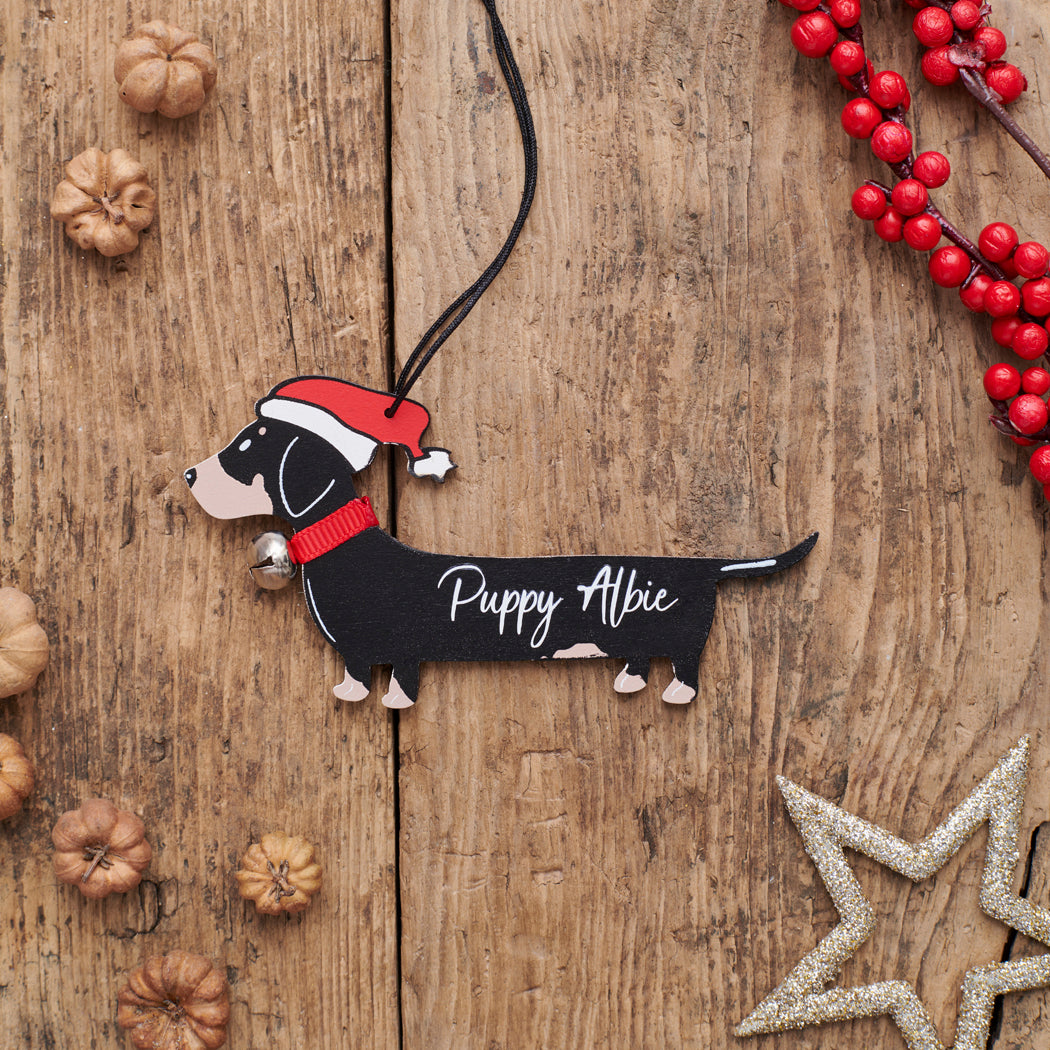 Personalised Dachshund Christmas decoration with custom message — wooden dog decoration with Father Christmas hat and jingle bell collar by Sweet William Designs