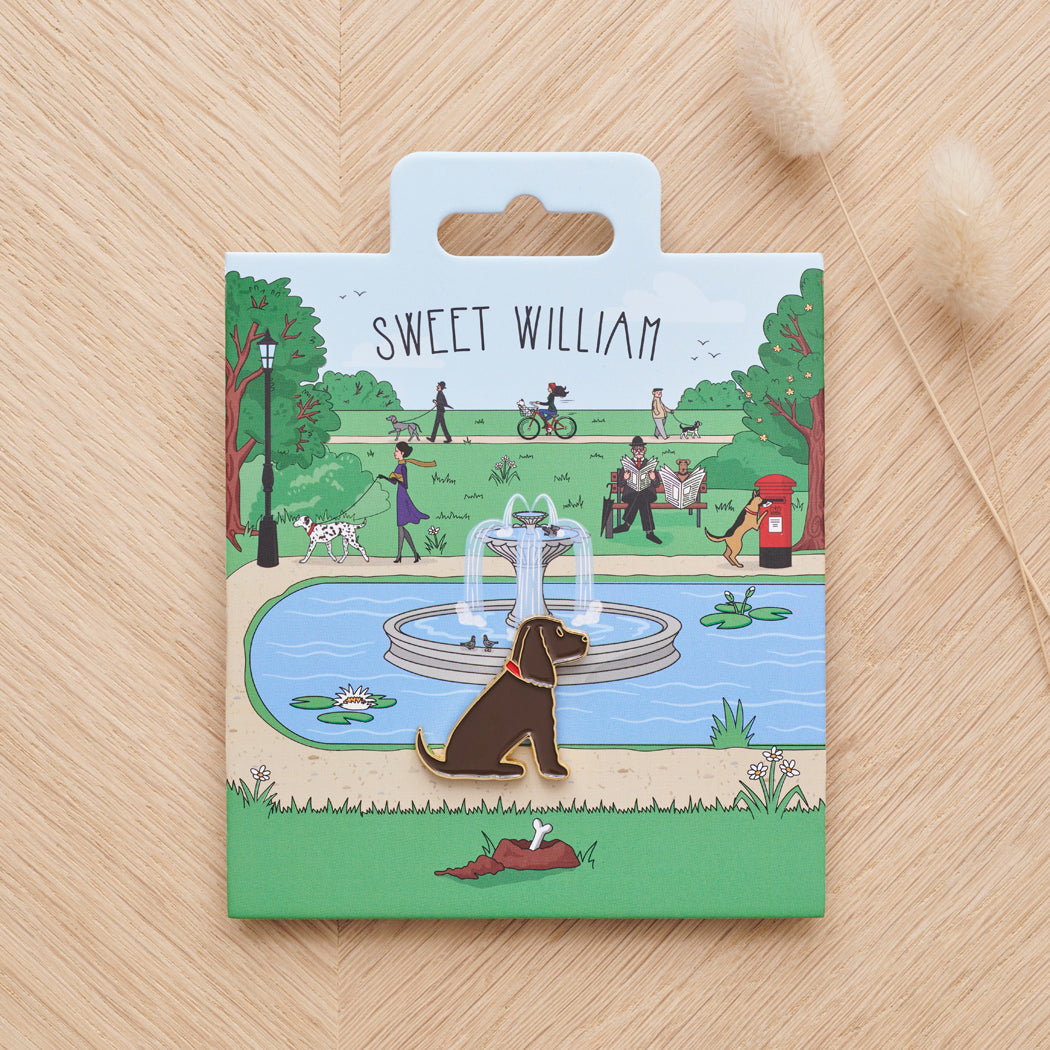 Chocolate Cocker Spaniel enamel dog pin on Sweet William Designs park scene backing card — thoughtful gift for Chocolate Cocker Spaniel lovers