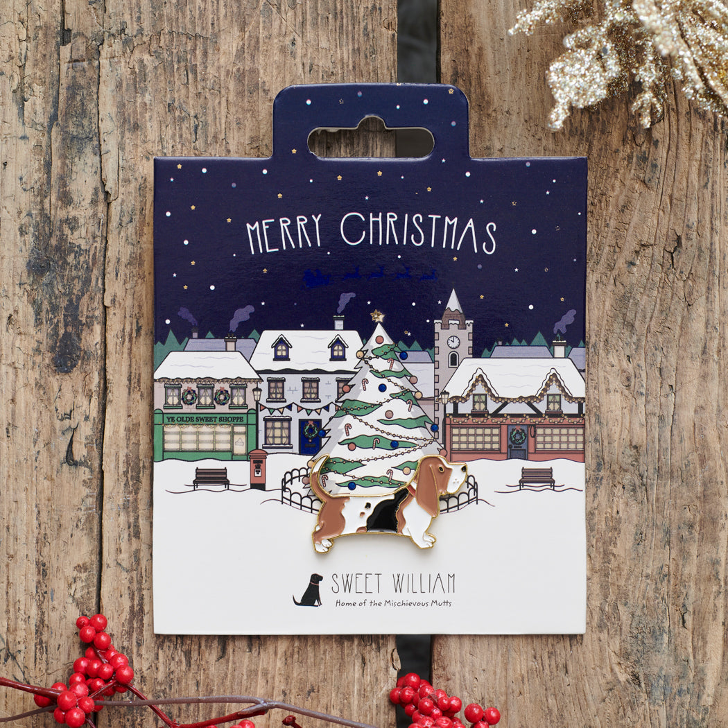 Basset Hound Christmas dog pin on festive village backing card — gold-plated enamel dog lover gift by Sweet William Designs