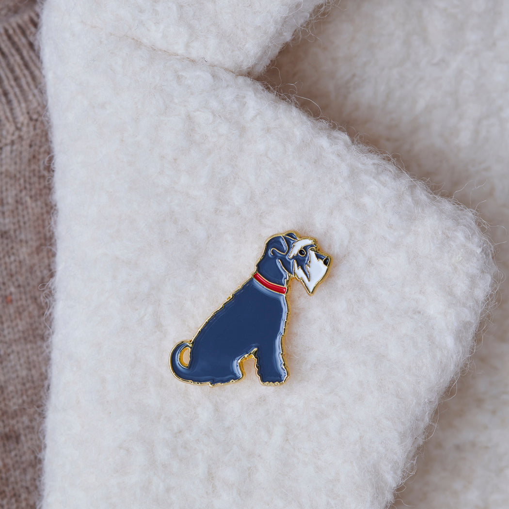 Close-up of Grey Schnauzer enamel pin attached to a wool jacket collar — gold-plated dog pin, Christmas gift for Schnauzer lovers