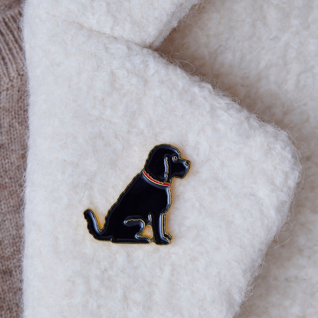 Black Cockapoo / Labradoodle enamel pin worn on a wool jacket collar — gold-plated dog pin, perfect gift for dog lovers