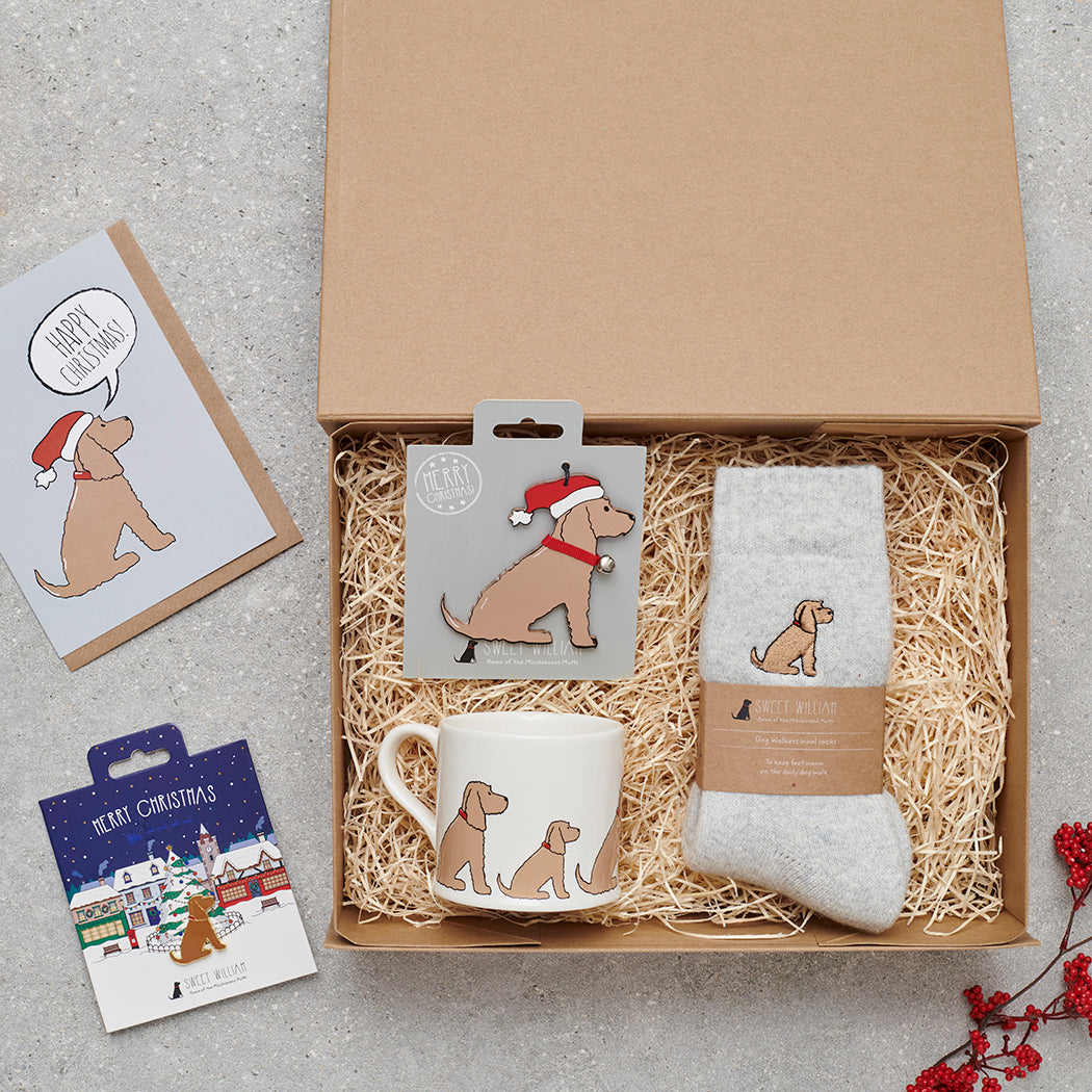 Golden Cocker Spaniel Christmas gift hamper with a matching Golden Cocker Spaniel Christmas pin, socks, mug, Christmas decoration and greeting card by Sweet William Designs