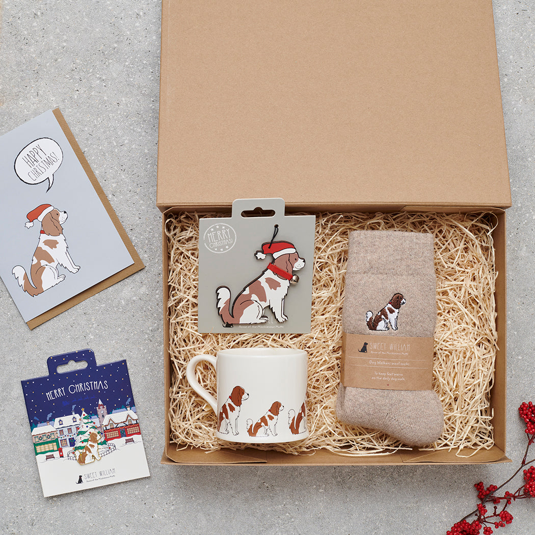 Cavalier King Charles Spaniel Christmas gift hamper with a matching Cavalier Christmas pin, socks, mug, Christmas decoration and greeting card by Sweet William Designs