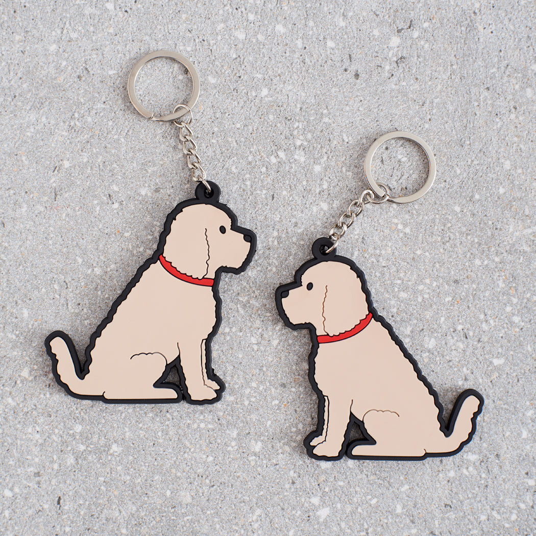 Apricot Cockapoo / Labradoodle keyring showing both sides — double-sided PVC design with Sweet William's classic illustration