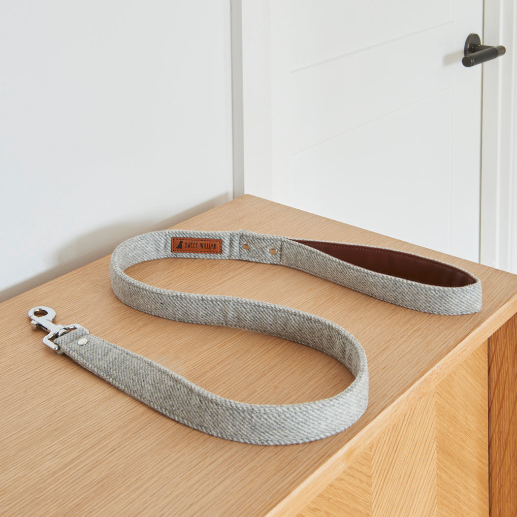 Grey tweed dog lead with vegan leather-lined handle and silver clasp