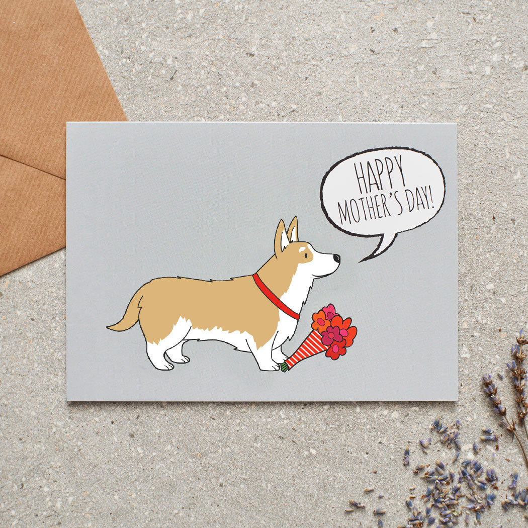 Corgi Mother's Day card featuring illustrated Corgi holding flowers — blank inside with optional handwritten message, perfect gift for dog mums