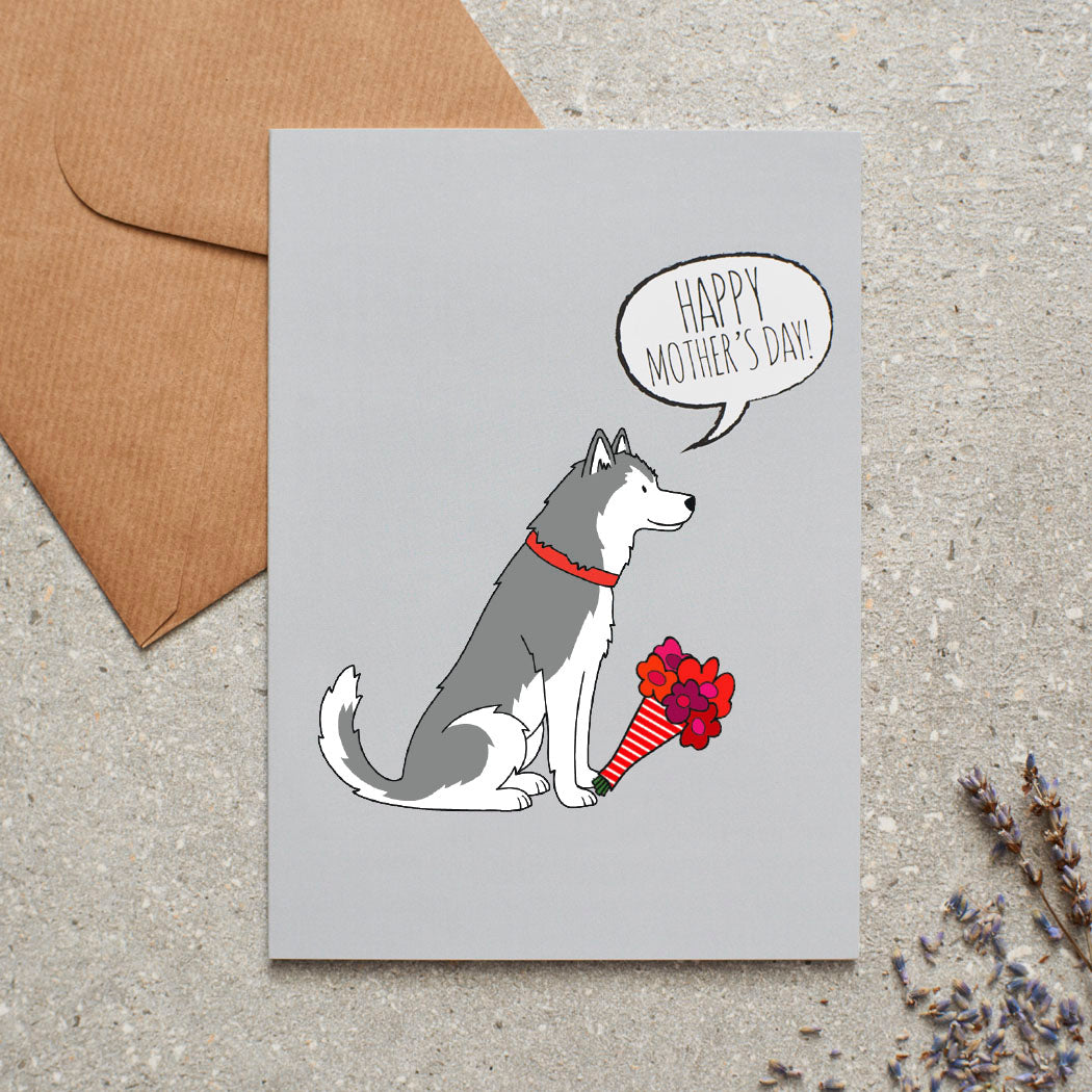 Husky / Malamute Mother's Day card featuring illustrated Husky holding flowers — blank inside with optional handwritten message, perfect gift for dog mums