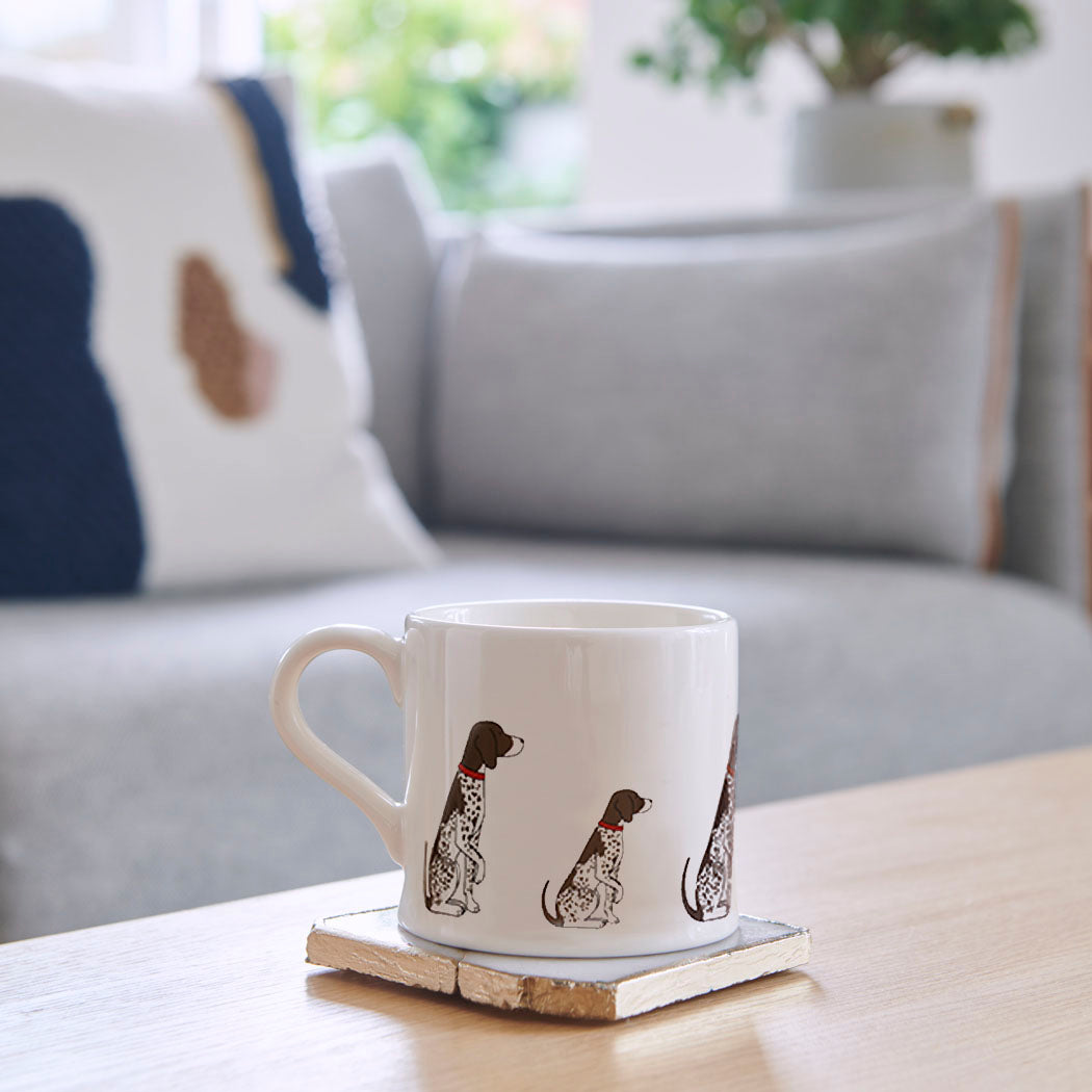German Shorthaired Pointer mug on coffee table — illustrated ceramic dog mug by Sweet William Designs