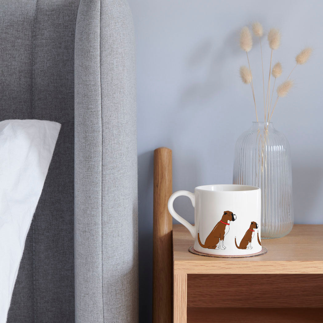 Sweet William Boxer Mug on a bedside table — Boxer dog lover gift mug