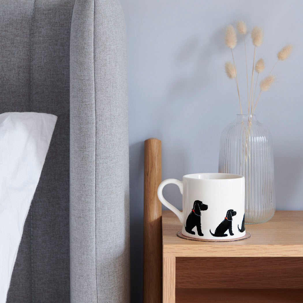 Sweet William Black Cocker Spaniel Mug on a bedside table — Black Cocker Spaniel dog lover gift mug