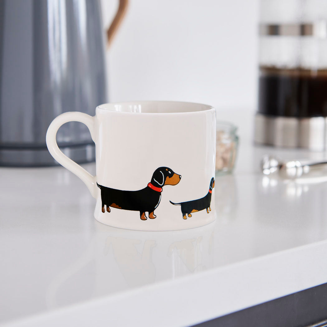 Sweet William Dachshund Mug in a kitchen setting — illustrated Dachshund ceramic mug
