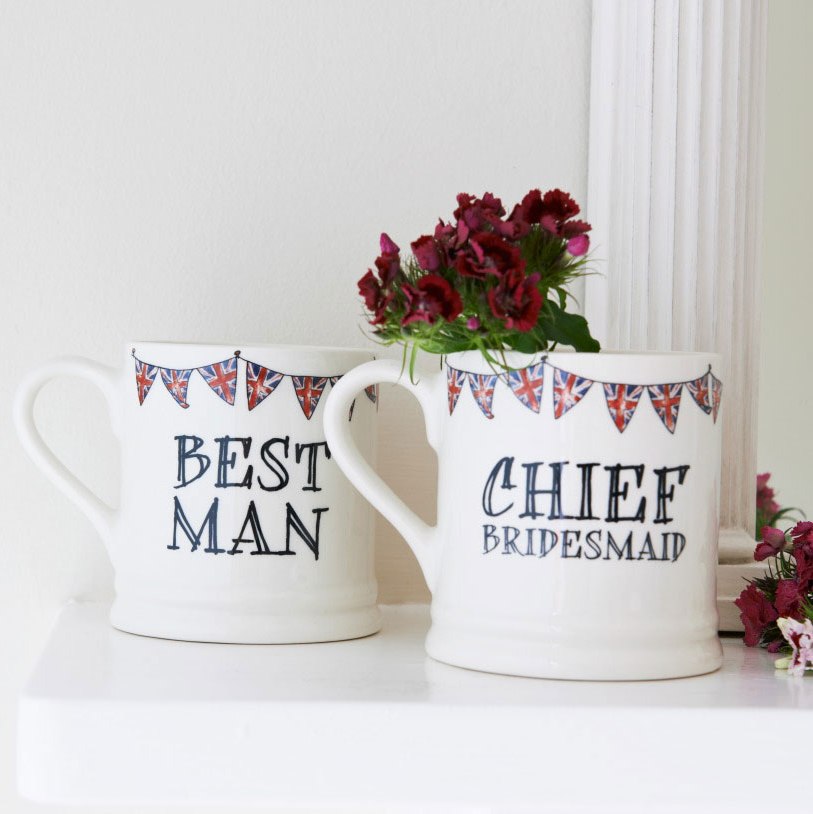 Best Man mug with Union Jack bunting, displayed beside flowers as a thoughtful wedding keepsake