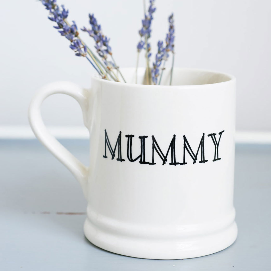 Simple ceramic Mummy mug by Sweet William Designs, styled with lavender stems, a thoughtful gift for Mum