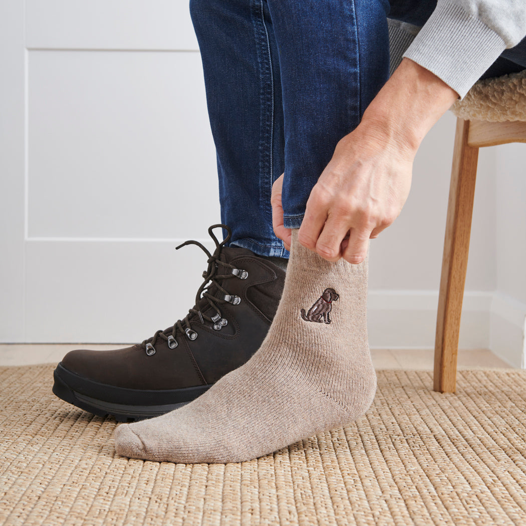 Man wearing Chocolate Labradoodle dog walking socks — embroidered wool blend, unisex gift for dog lovers