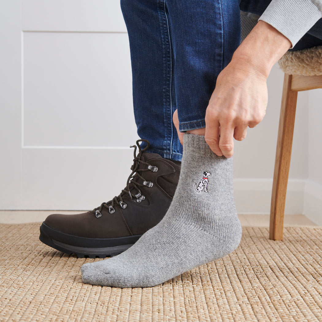 Man wearing Dalmatian dog walking socks — embroidered wool blend, unisex gift for dog lovers