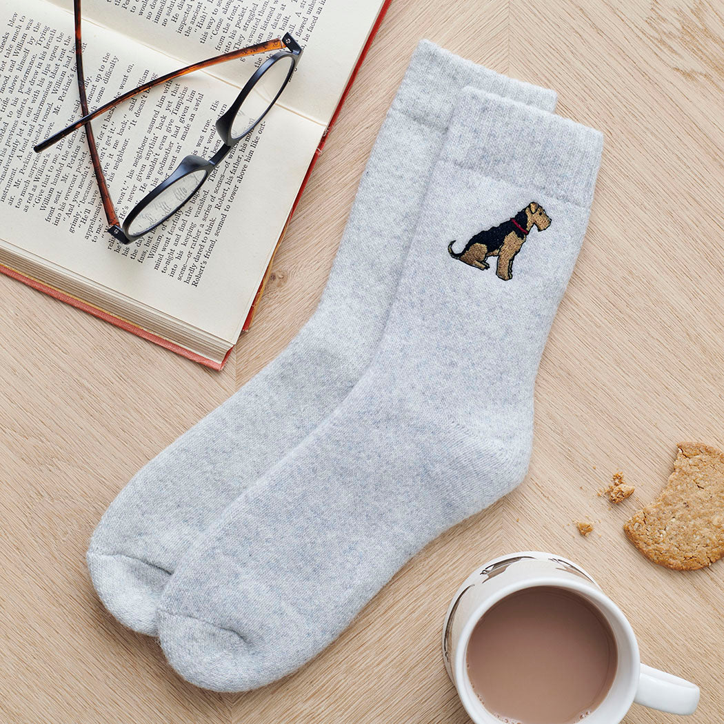 Airedale Terrier embroidered socks laid flat – unisex wool walking socks