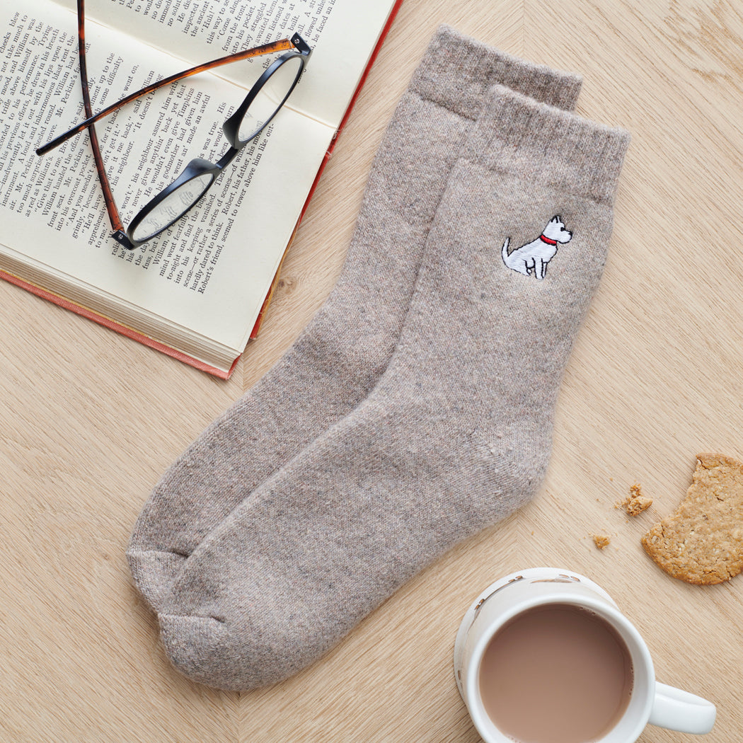 Westie dog walking socks laid flat — embroidered unisex wool blend socks, one size fits UK 3–12