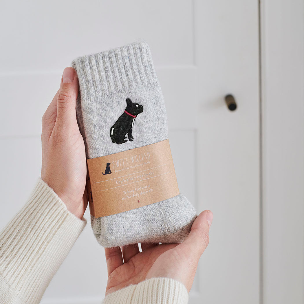 French Bulldog embroidered socks held in hand — soft wool blend dog lover gift by Sweet William Designs