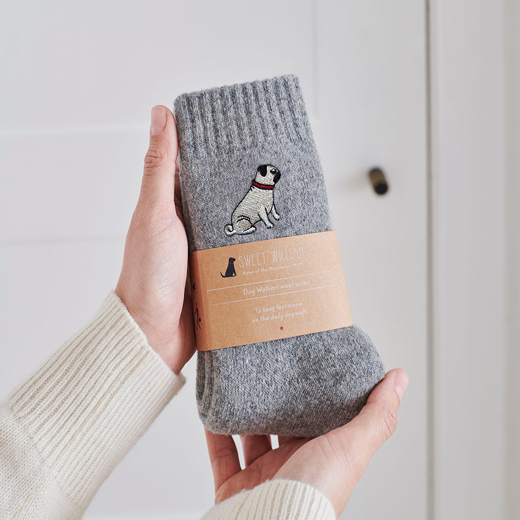 Pug embroidered socks held in hand — soft wool blend dog lover gift by Sweet William Designs