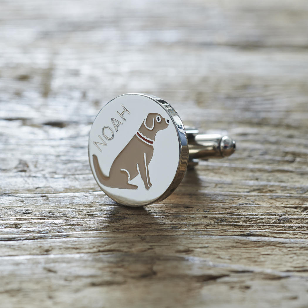 Close-up of personalised Golden Retriever cufflink engraved with name on rustic wood — silver-plated gift for Golden Retriever owners