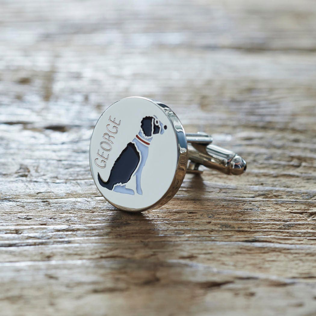 Close-up of personalised Black & White Springer Spaniel cufflink engraved with name on rustic wood — silver-plated gift for Springer Spaniel owners