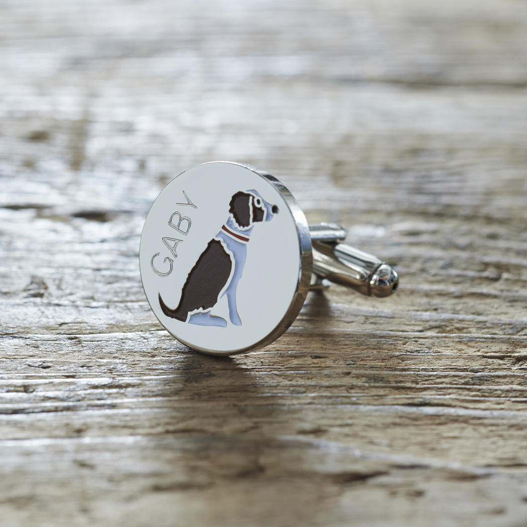 Close-up of personalised Liver & White Springer Spaniel cufflink engraved with name on rustic wood — silver-plated gift for Springer Spaniel owners