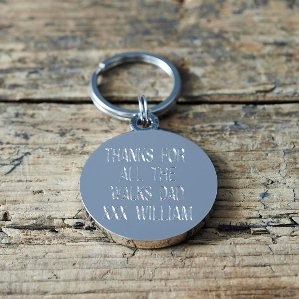 Back of personalised dog tag engraved with custom message — thoughtful gift for dog dads