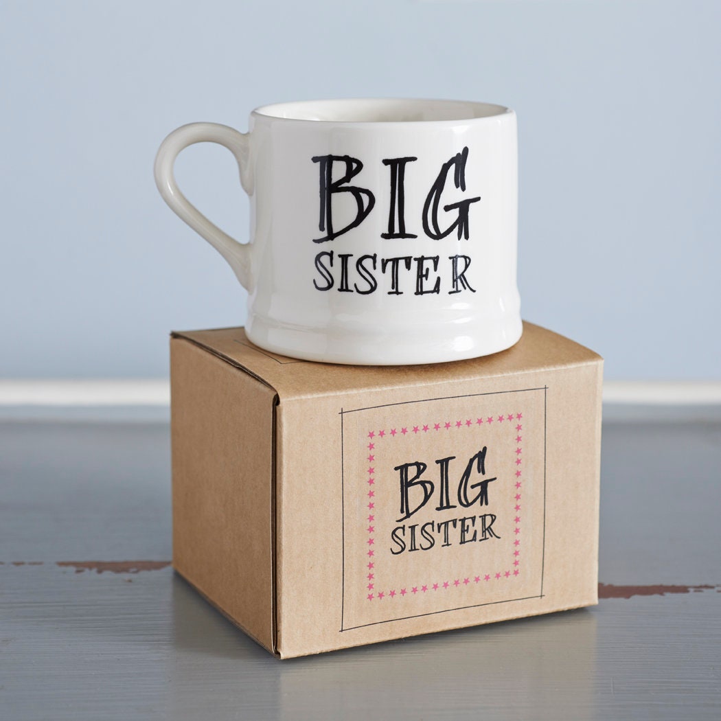 Ceramic “Big Sister” mug displayed on its kraft gift box as a thoughtful gift for a sister