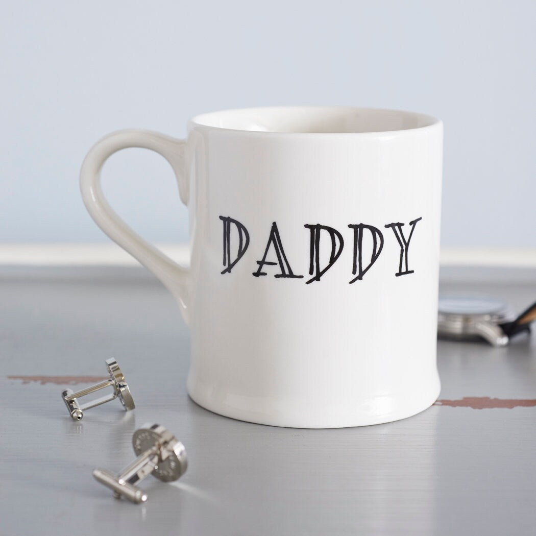 Ceramic Daddy mug with a simple plain design and cufflinks, a thoughtful gift for a much-loved Dad