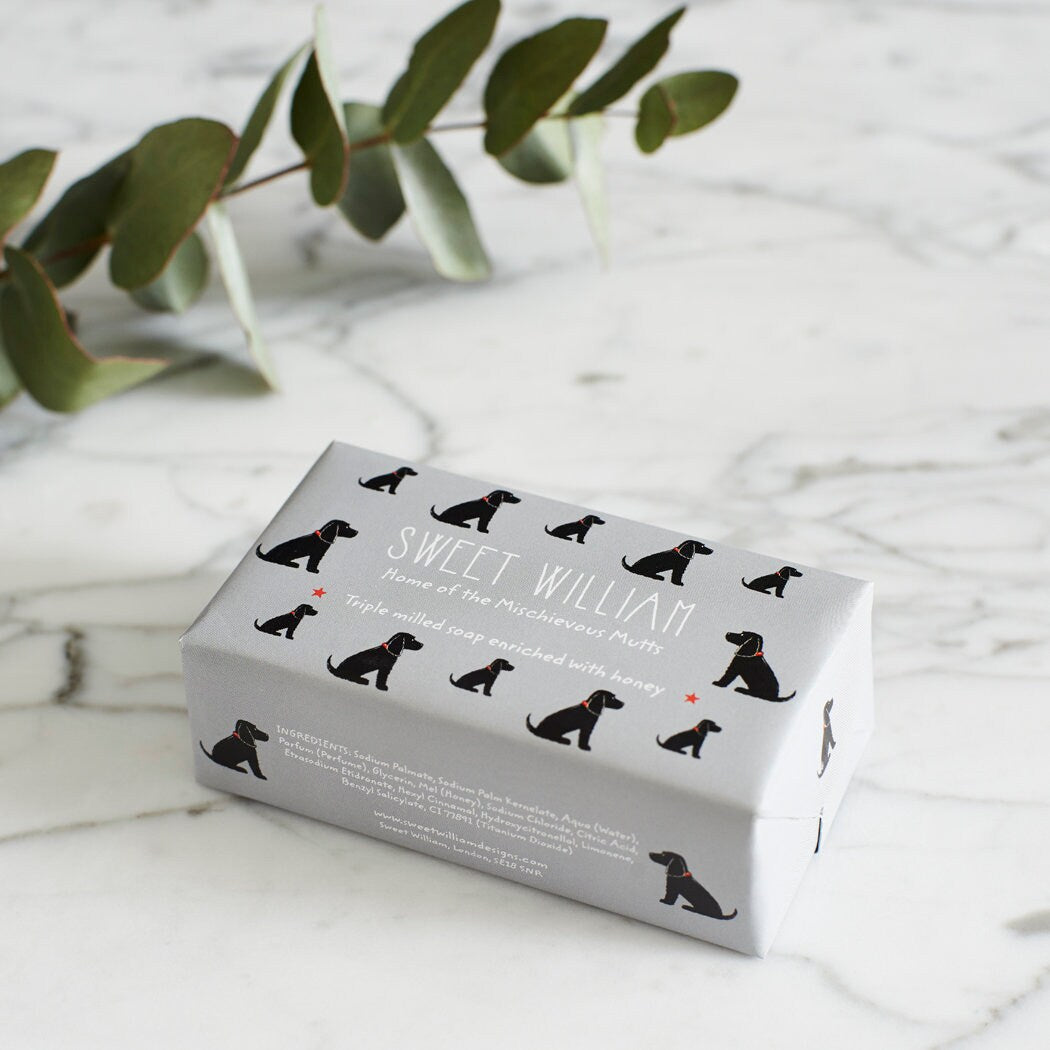 Black Cocker Spaniel triple milled soap on marble surface — honey-enriched luxury soap in Black Cocker Spaniel illustrated packaging by Sweet William Designs