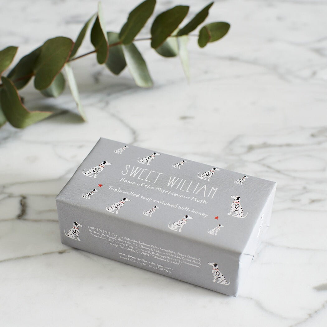 Dalmatian triple milled soap on marble surface — honey-enriched luxury soap in Dalmatian illustrated packaging by Sweet William Designs