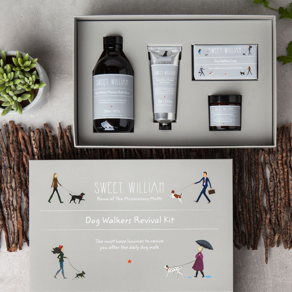 Dog Walkers Revival Kit open gift box showing bath foam, hand cream, soap and foot cream — luxury dog walker gift set by Sweet William Designs