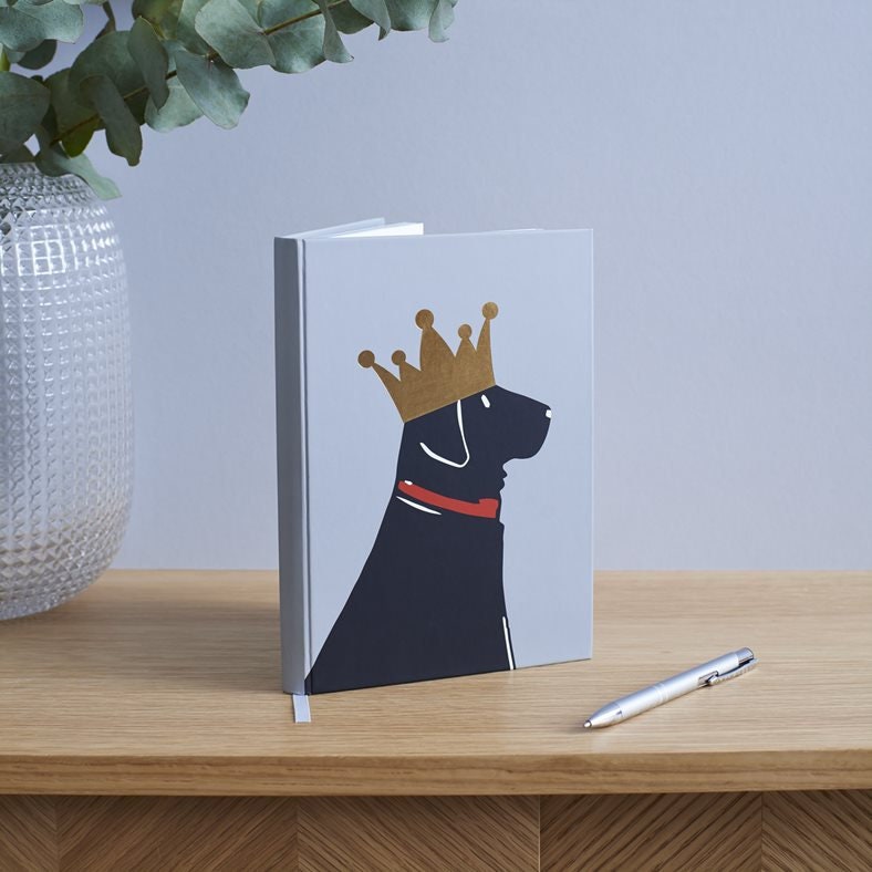 Black Labrador notebook standing upright — A5 soft-touch hard cover with gold foil crown design, thoughtful gift for Black Lab owners