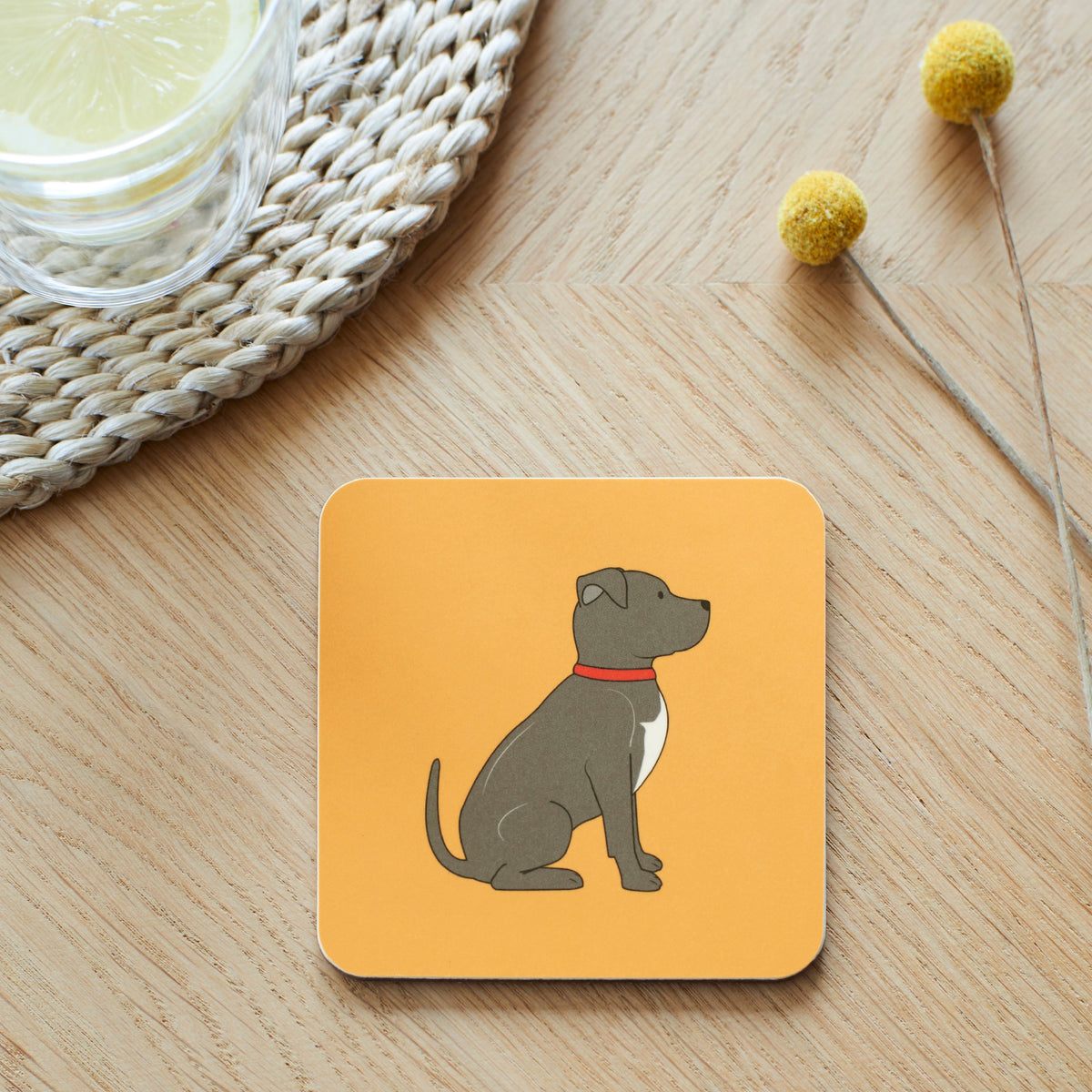 Close-up of Staffie coaster — sustainably sourced eucalyptus wood with cork backing, heat-resistant and easy to wipe clean
