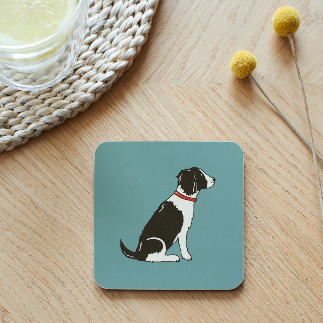 Close-up of Black & White Springer Spaniel coaster — sustainably sourced eucalyptus wood with cork backing, heat-resistant and easy to wipe clean