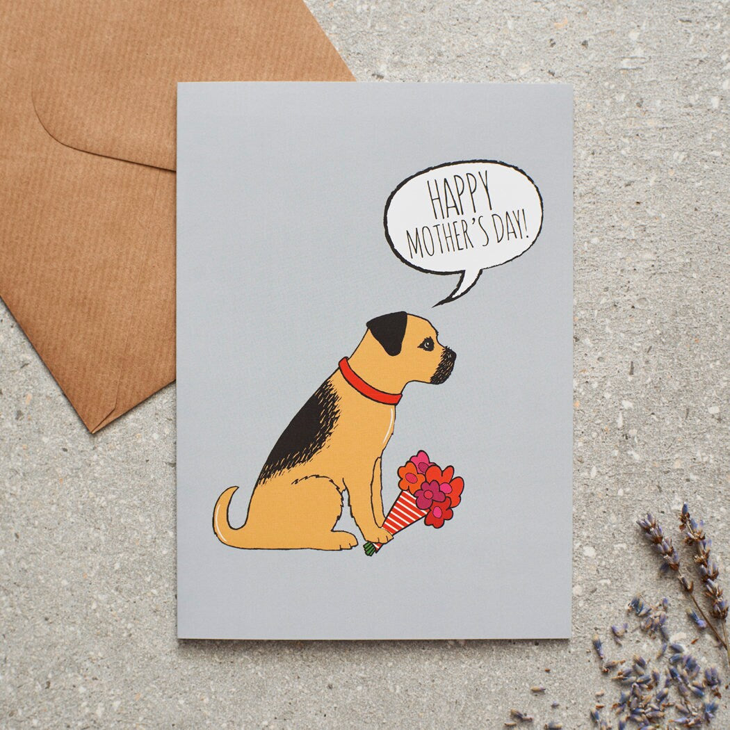 Border Terrier Mother's Day card featuring illustrated Border Terrier holding flowers — blank inside, supplied with kraft envelope, by Sweet William Designs
