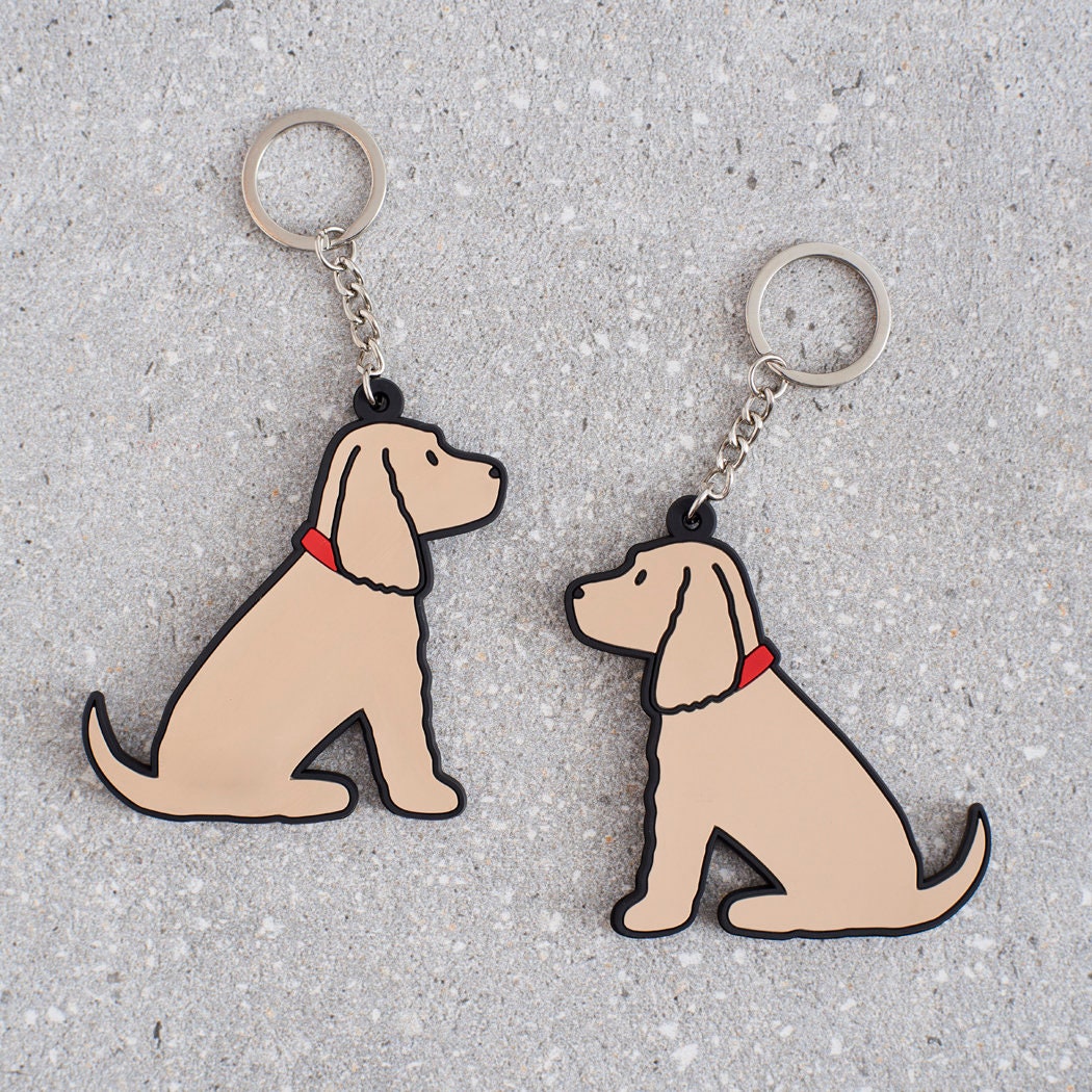 Golden Cocker Spaniel keyring showing both sides — double-sided PVC design with Sweet William's classic illustration
