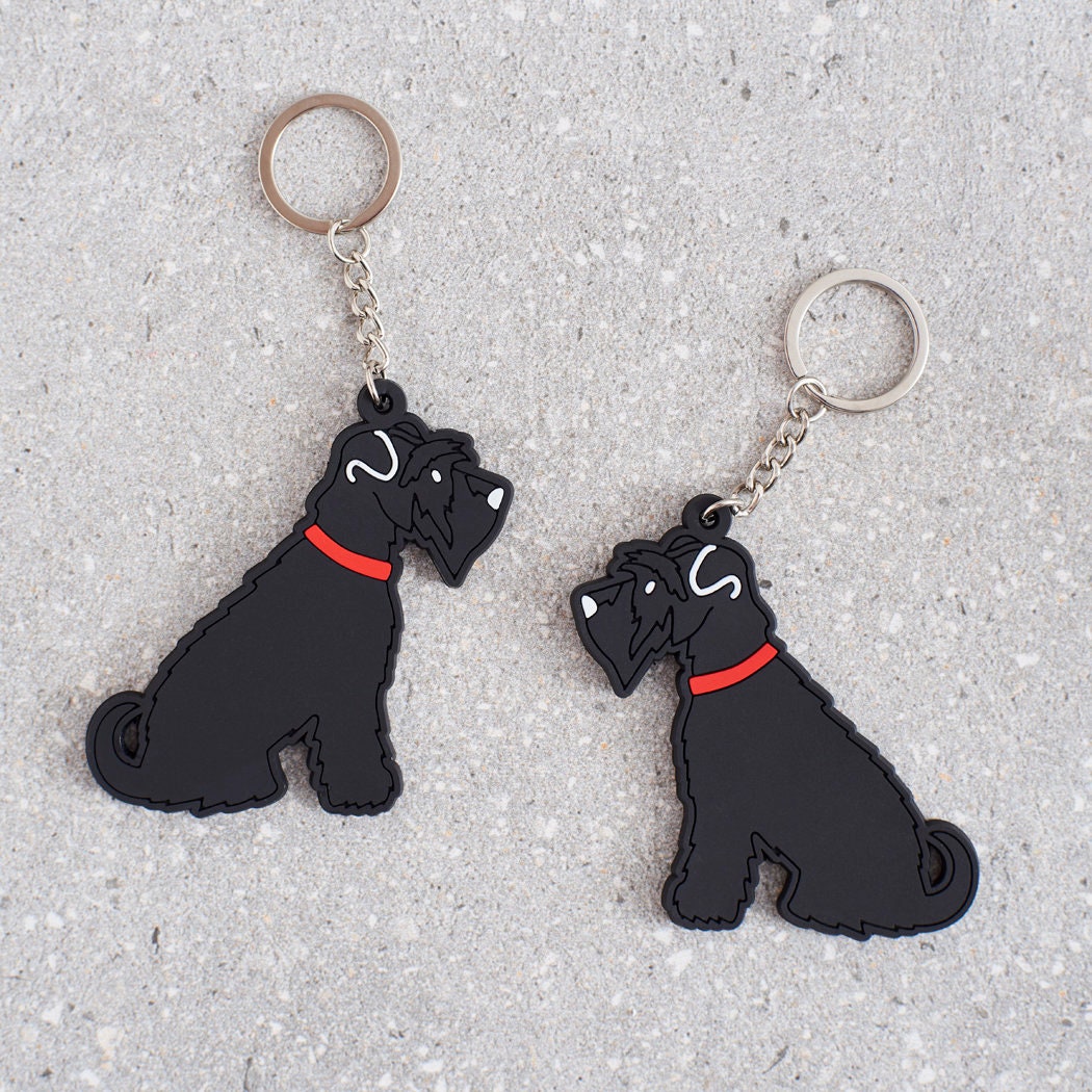 Black Schnauzer keyring showing both sides — double-sided PVC with Sweet William's classic illustration