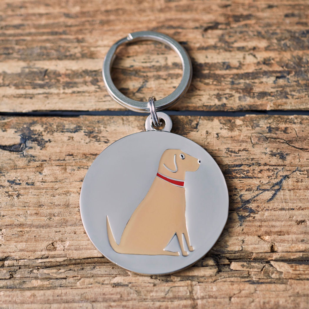 Close-up of Yellow Labrador dog ID tag — silver-plated brass with illustrated Yellow Lab design, personalised dog tag by Sweet William Designs