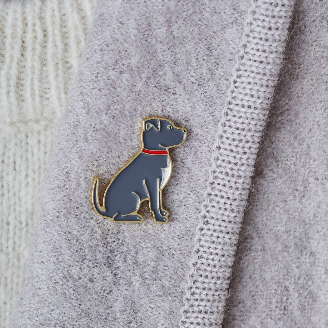 Close-up of Staffie enamel pin attached to a wool jacket collar — gold-plated dog lover gift by Sweet William Designs